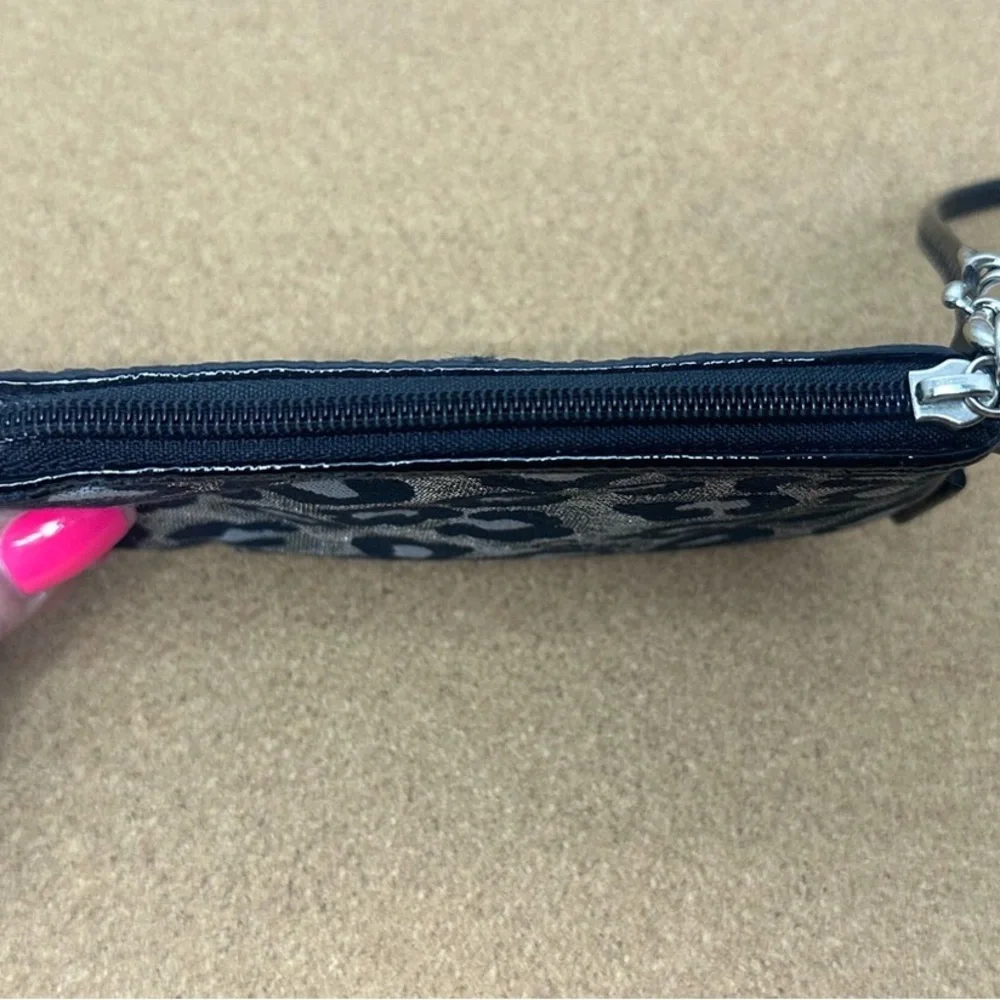 Coach wristlet crafted
